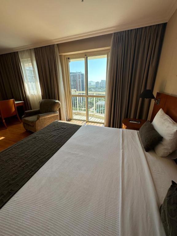 Flat Com Vista Panoramica -15- Na Barra Da Tijuca - Estacionamento Gratuito - Frigobar - Ar Condicionado - Piscina - Academia - Balsa Para Praia Gratis - Varanda - Vista Parcial Mar E Lagoa Rio de Janeiro Bagian luar foto